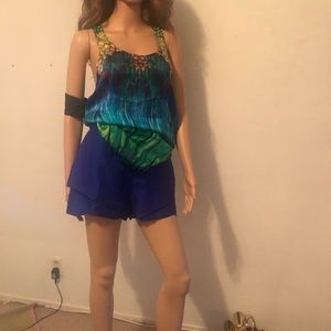 Silk resort top. Jewel colors with black border.SAUVAGE